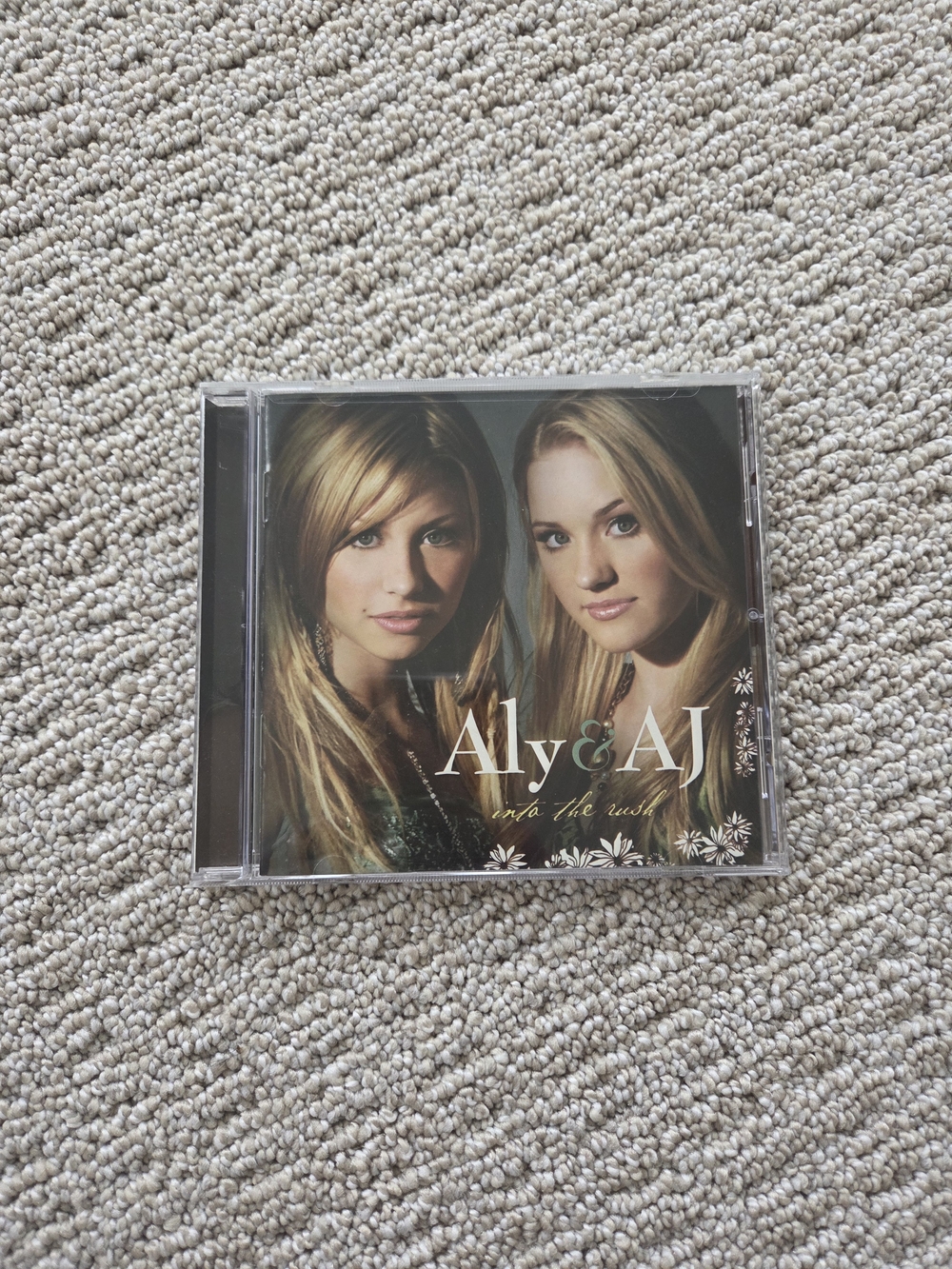 Aly & AJ Into the Rush CD - Clear Jewel Case, Beige Cover Art